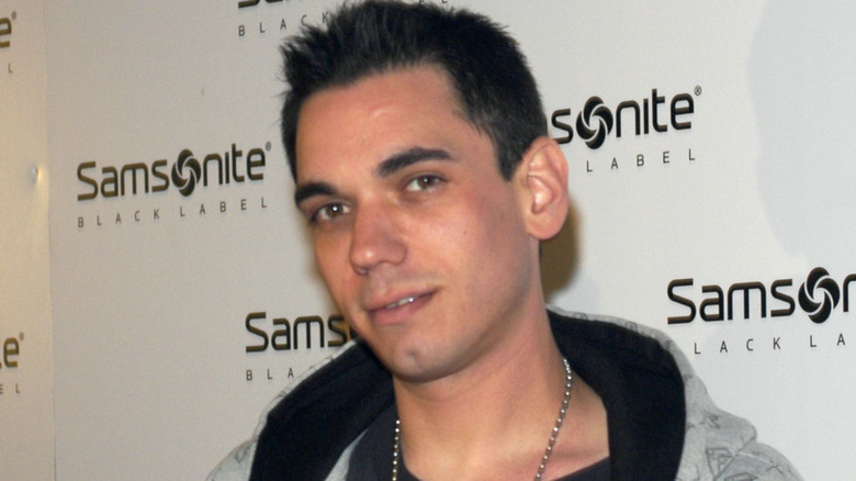 DJ AM coyly looking at camera