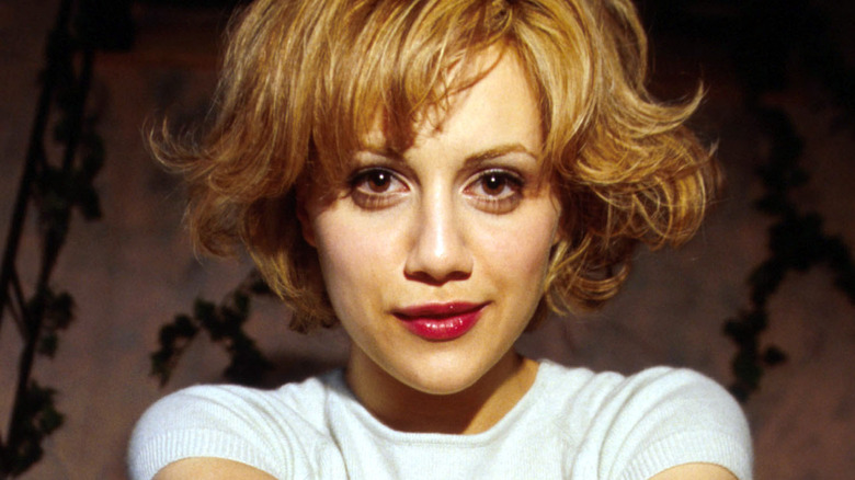 Brittany Murphy wide-eyed staring at camera in publicity shot