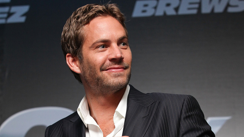 Paul Walker looking to side and smiling