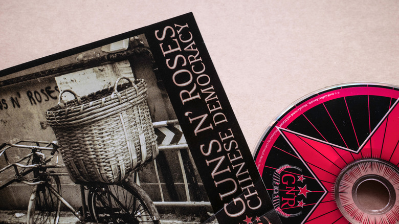 Guns N' Roses - Chinese Democracy' music album CD with cover art close-up