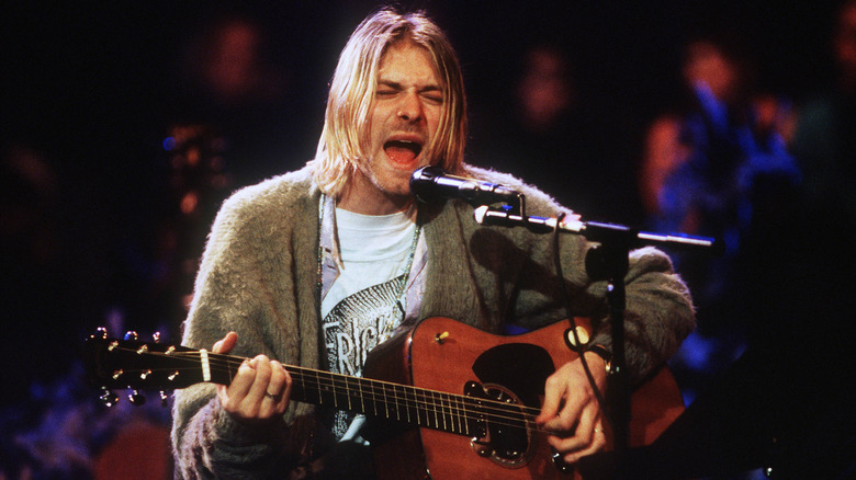 Kurt Cobain singing into mic