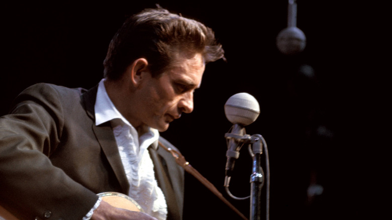 Johnny Cash performing during concert