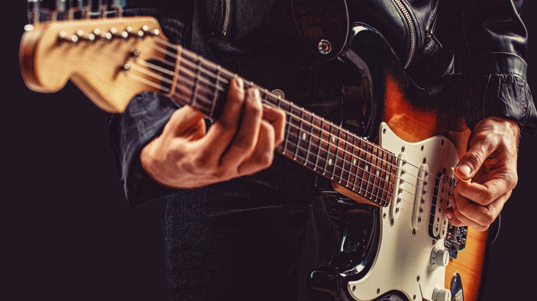 Man playing electric guitar