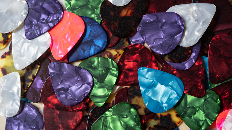 A pile of colorful guitar picks