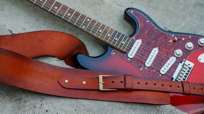 A strap on an electric guitar