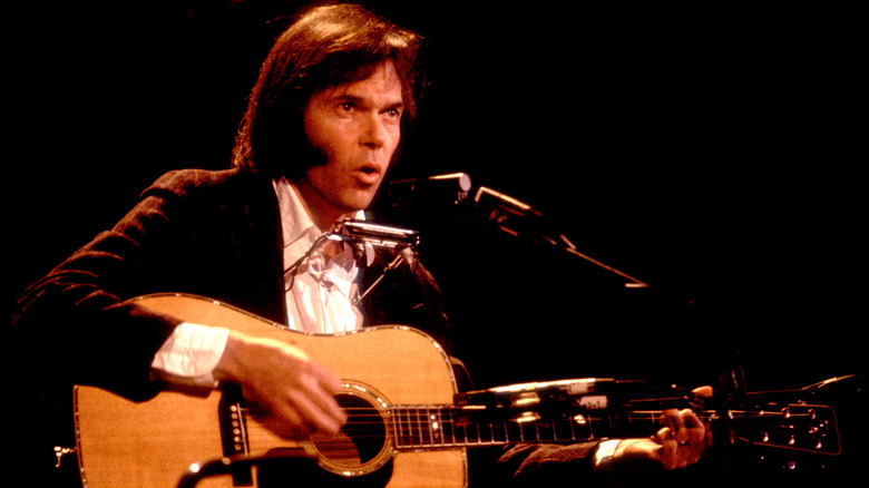 Neil Young performs in 1983