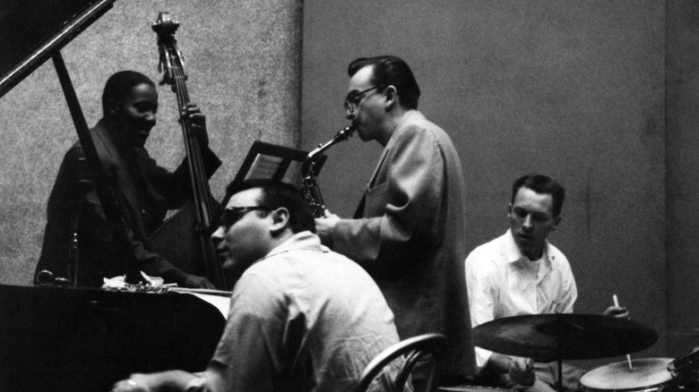 Vince Guaraldi and other musicians in recording studio