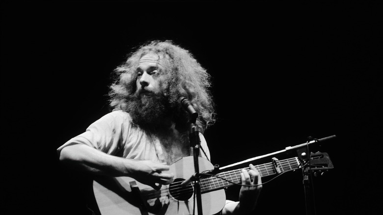 Ian Anderson of Jethro Tull playing guitar