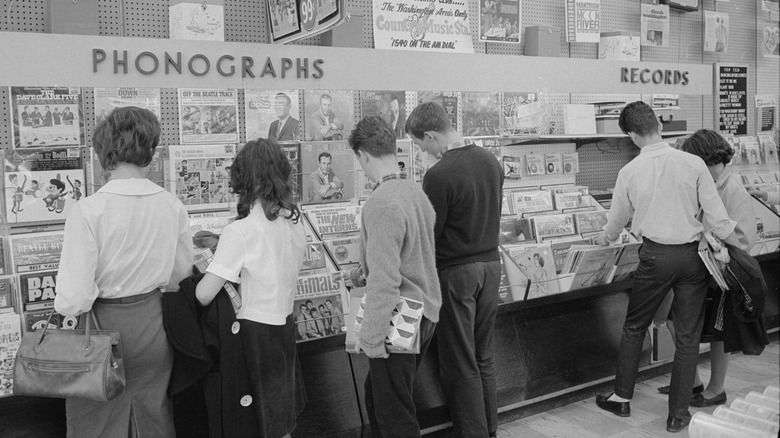 People shopping in a record store.
