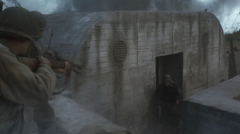 German soldier exiting bunker under fire, Saving Private Ryan