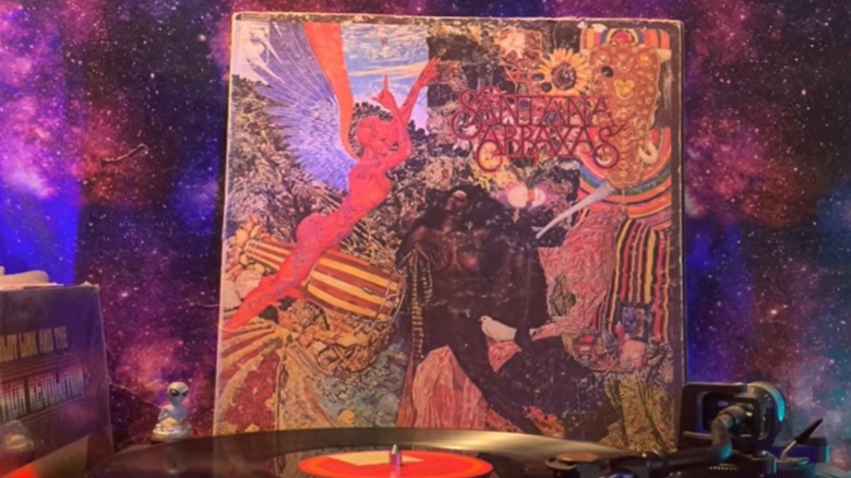 Santana's "Abraxas" album sleeve next to record playing