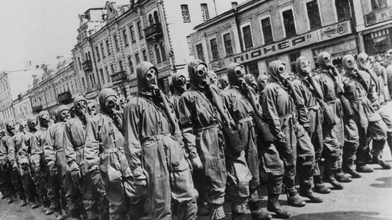 Civilians in gas masks drilling in Kiev