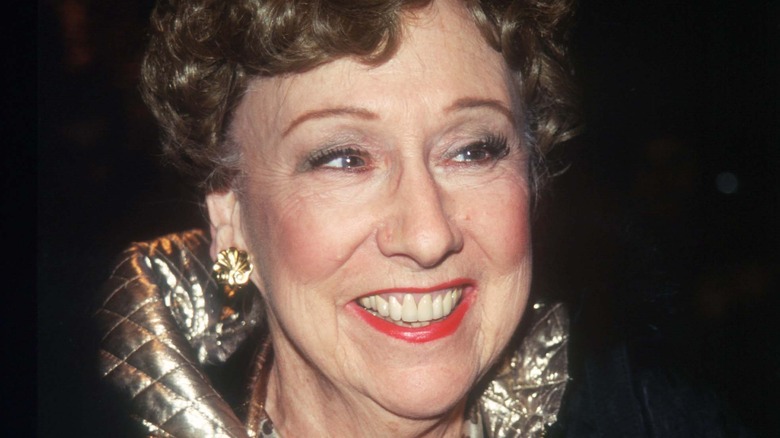 Jean Stapleton smiles at photographers