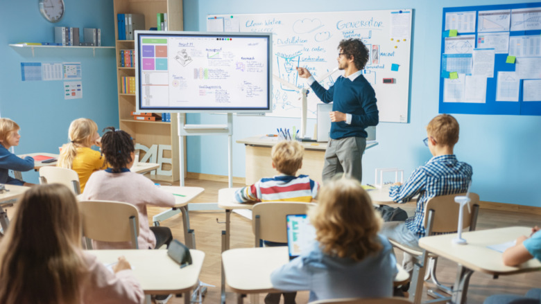 teacher standing in a classroom