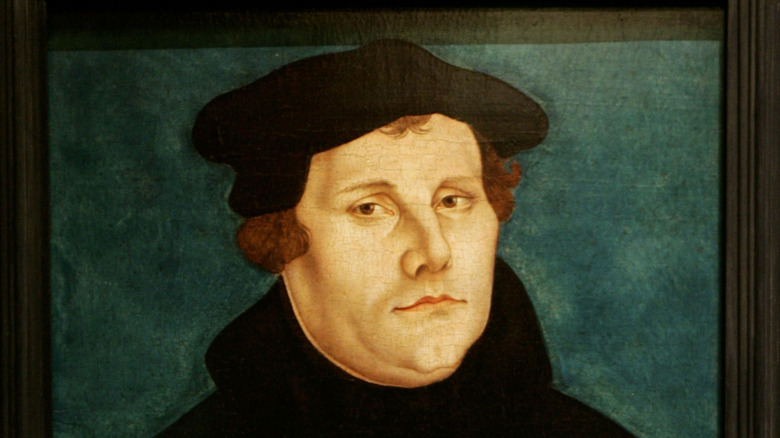 A portrait of Martin Luther wearing all black