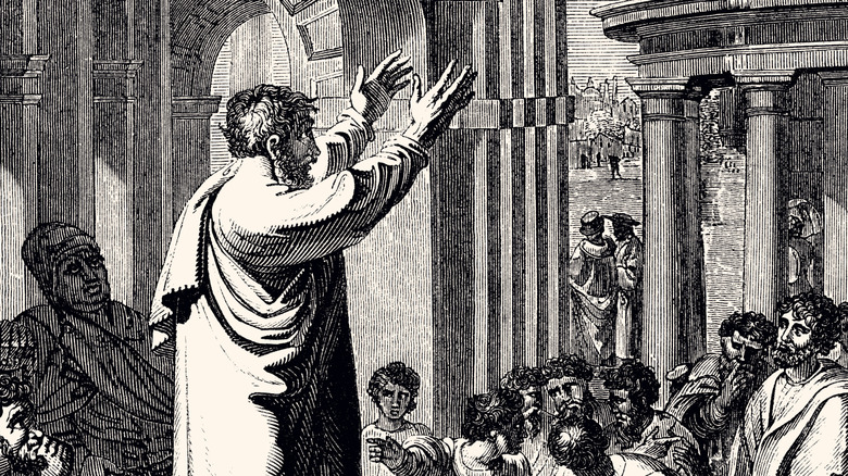 Paul preaching before a crowd