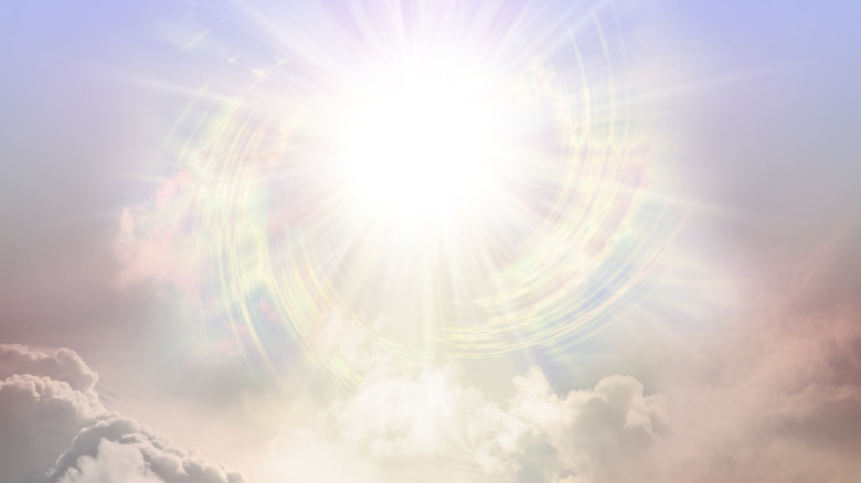 Bright sun among clouds