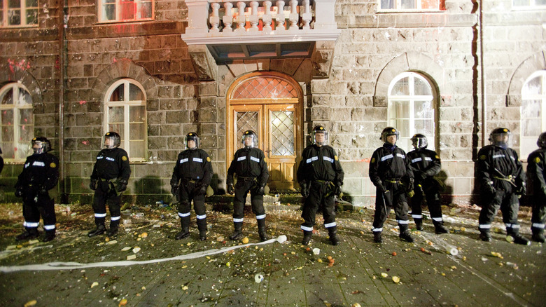 policemen guard icelandic parliament