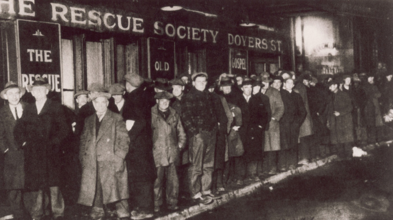 line of men seeking aid during great depression