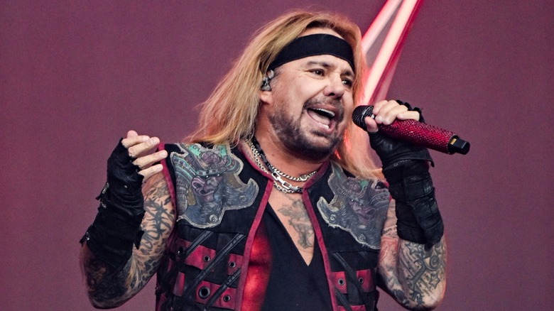 Vince Neil singing onstage