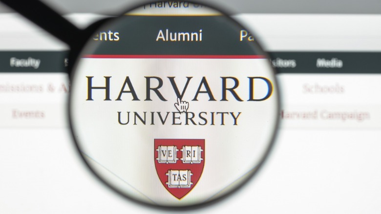 Harvard University logo in magnifying glass