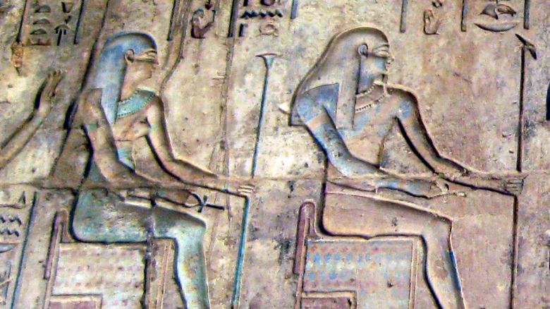 Kek and Kauket with human heads