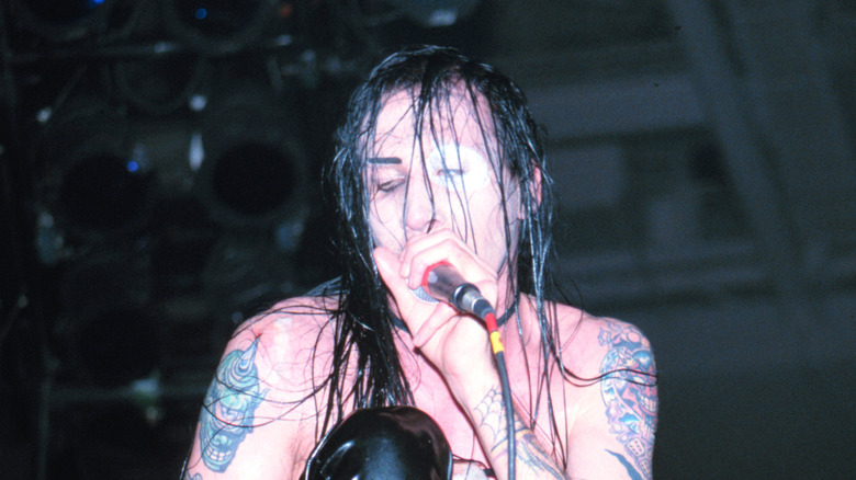 Marilyn Manson performing on stage in 1995
