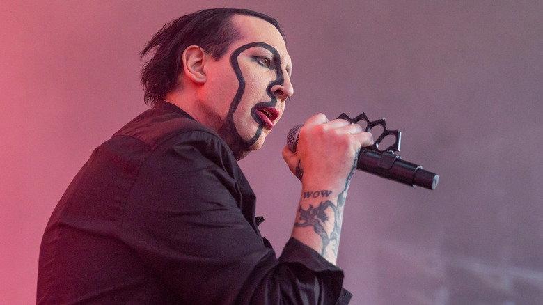 Marilyn Manson singing on stage in 2018