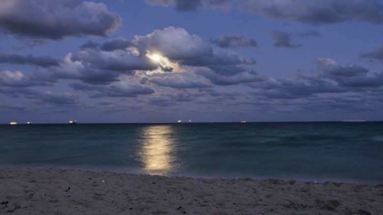 Moon rising over ocean from Miami Beach.