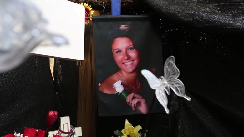 A picture of Tiffany Valiante surrounded by gifts