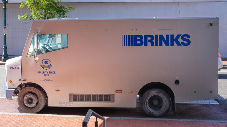 side view of Brink's truck parked