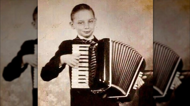 Young Barry Manilow playing accordion