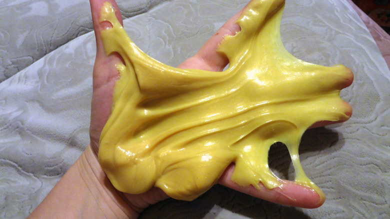 silly putty in hand