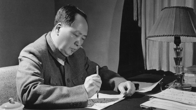 mao at a desk