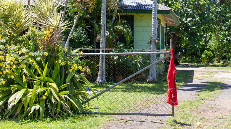 red flag outside house in apia samoa