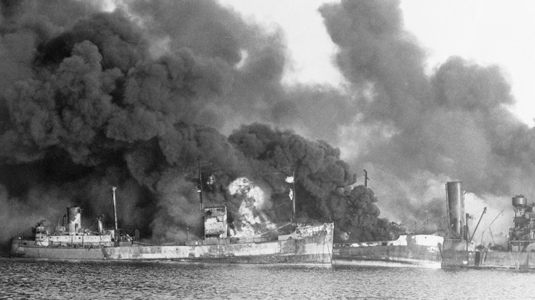 December 1943: American ships blaze after a Nazi attack on the Adriatic port of Bari