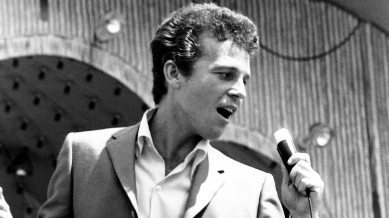 Bobby Vinton singing into microphone