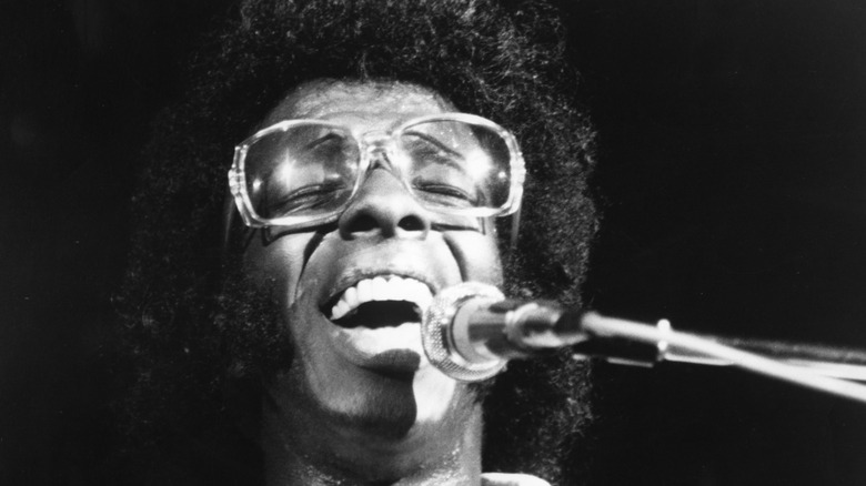 Closeup of Sly Stone performing at Woodstock