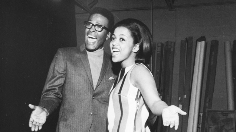 Marvin Gaye and Tammi Terrell singing alongside each other