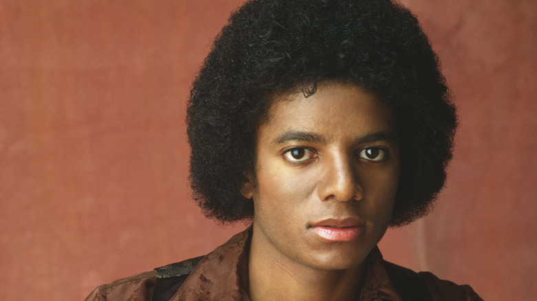 Michael Jackson in glittery suit with microphone