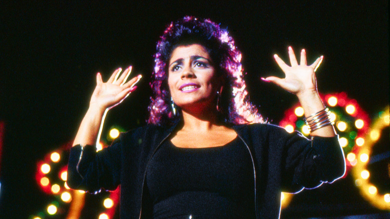 Lisa Lisa singing and dancing in music video