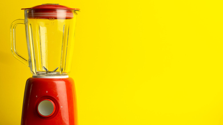 vintage blender yellow background