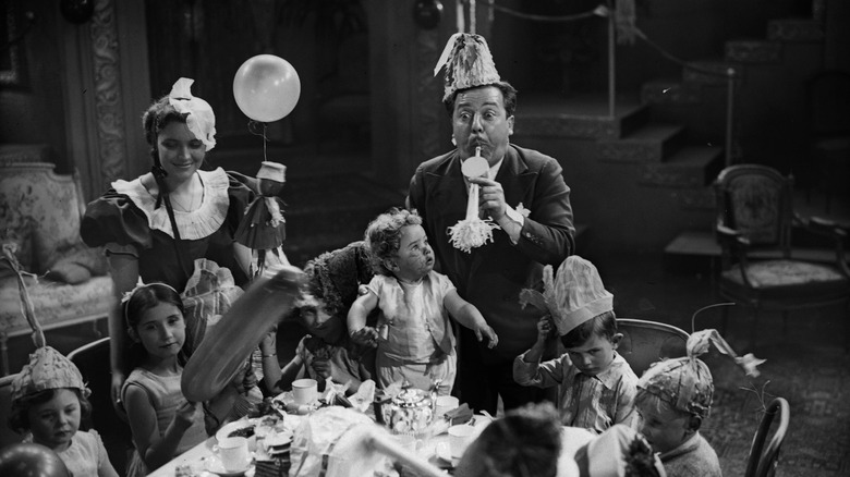 Monty Banks in in a film