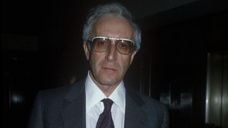Peter Sellers in glasses and suit
