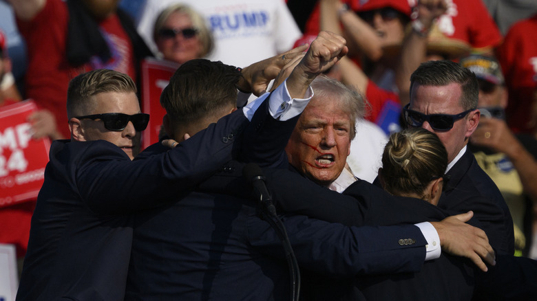Secret Service agents swarming Donald Trump after assassination attempt July 2024