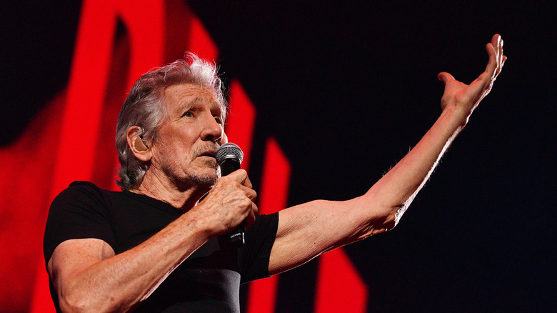 Roger Waters onstage with microphone