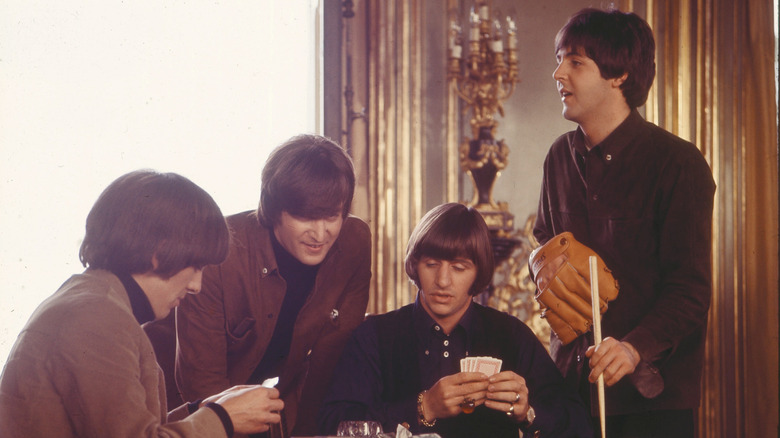 the beatles playing cards in scene from Help