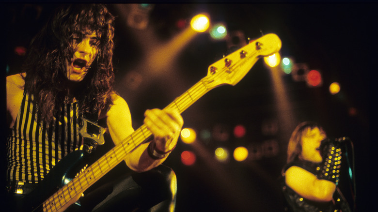 Steve Harris of Iron Maiden (with Bruce Dickinson in the background)