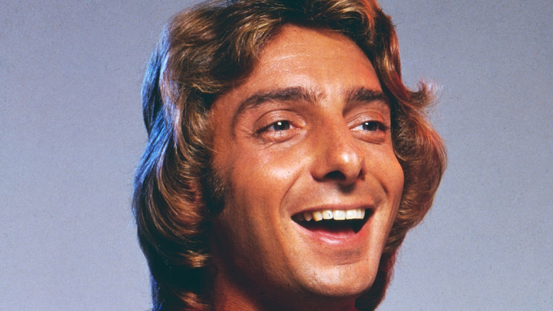 Barry Manilow smiling huge in late 1970s