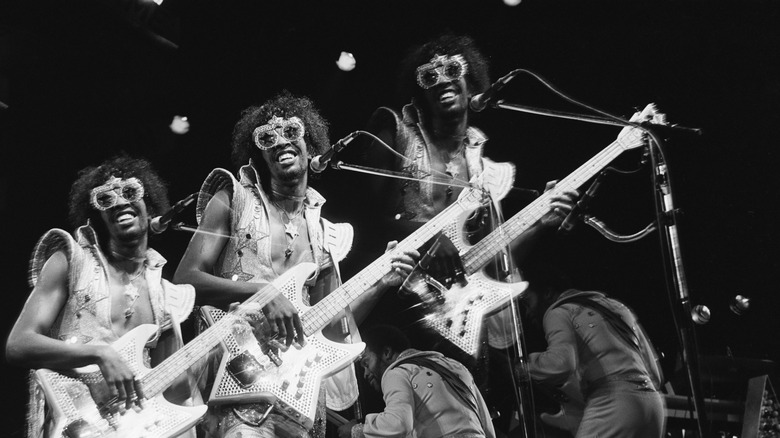 Triple exposure of Bootsy Collins playing bass in the 1970s